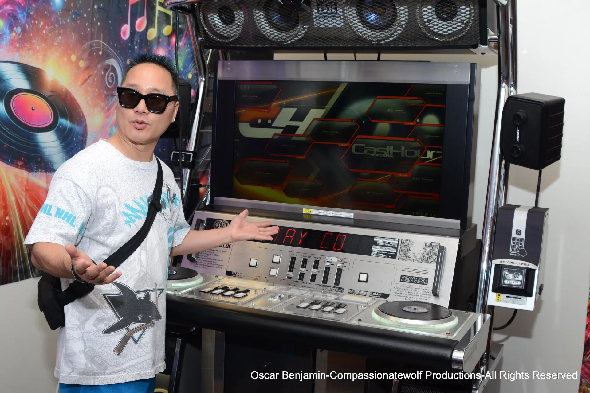 A visitor exploring the museum’s DJ equipment